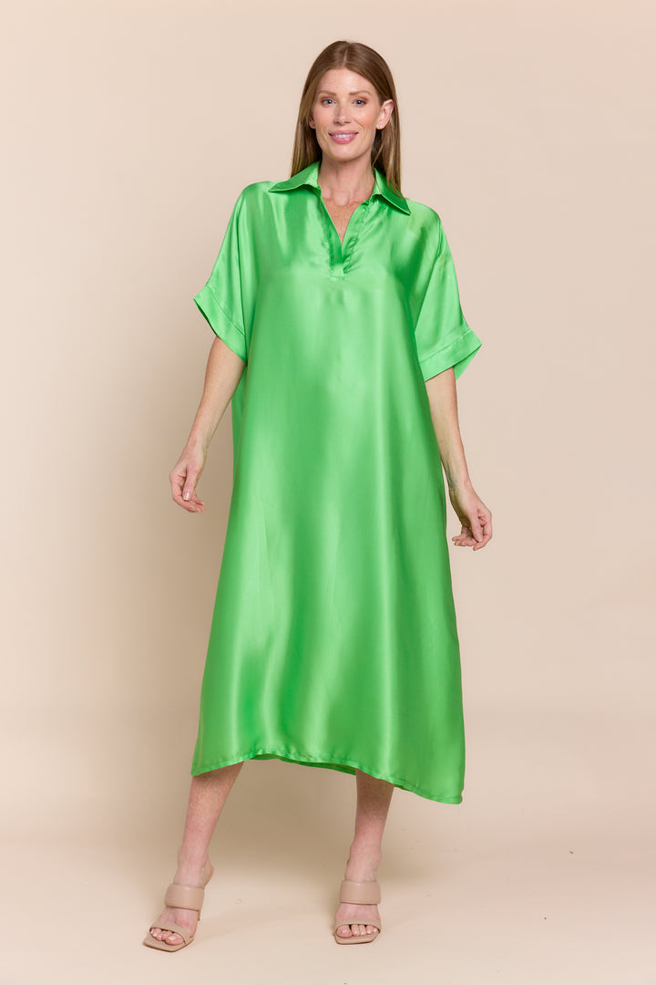 A woman wearing a green satin midi dress with short sleeves and a collar, size 2-10.